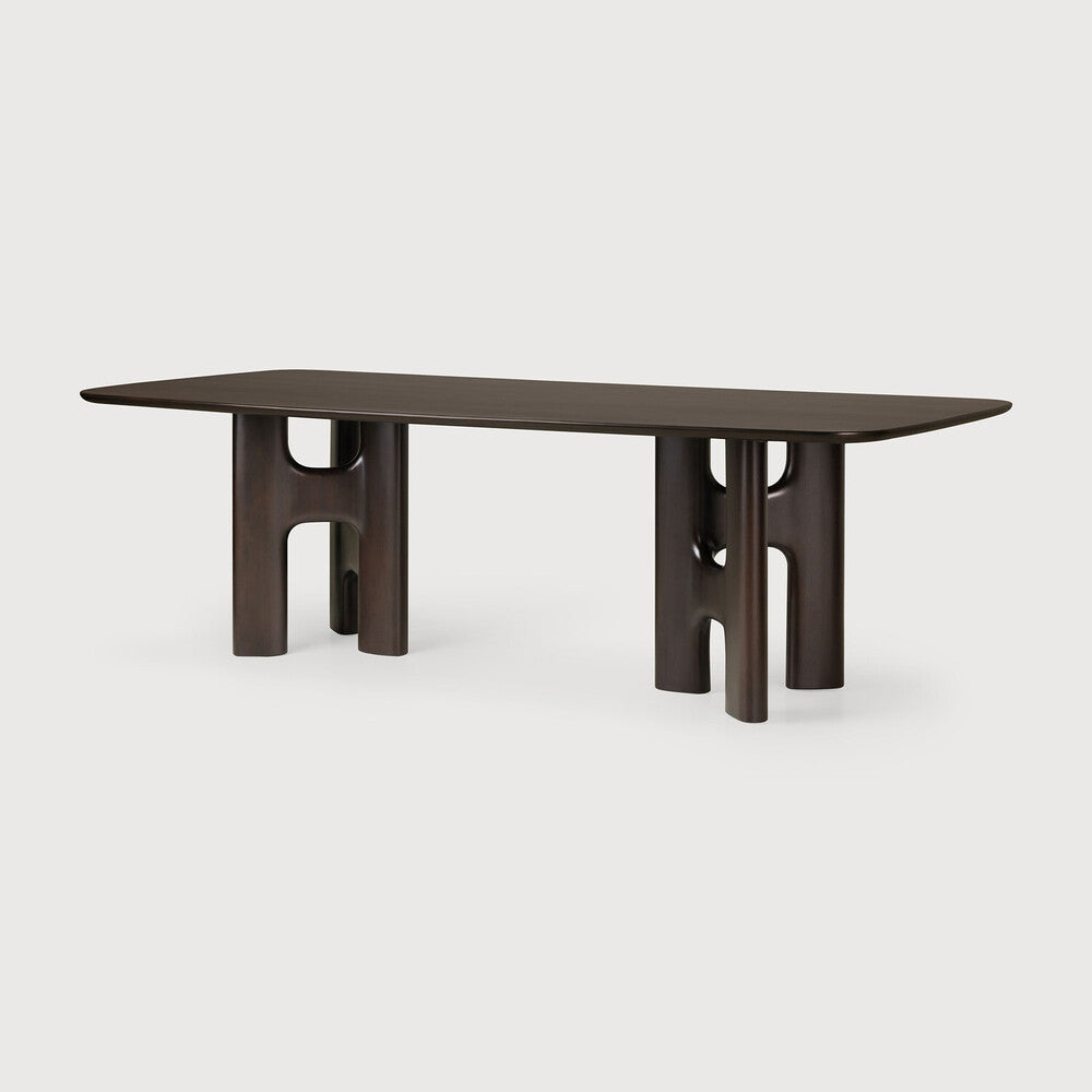 Ethnicraft Flow Dining Table in mahogany styled in a dining room