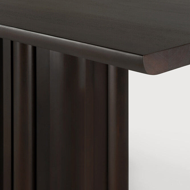 Ethnicraft Sequence Dining Table in mahogany styled in a dining room