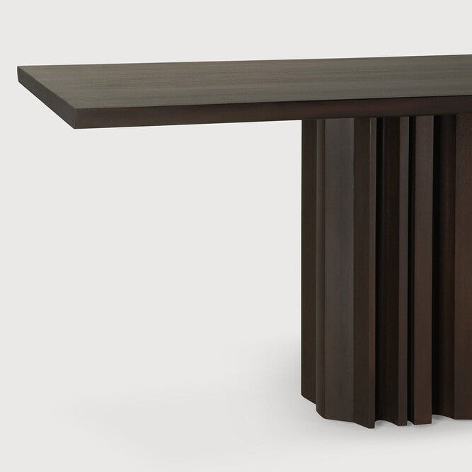 Ethnicraft Sequence Dining Table in mahogany styled in a dining room