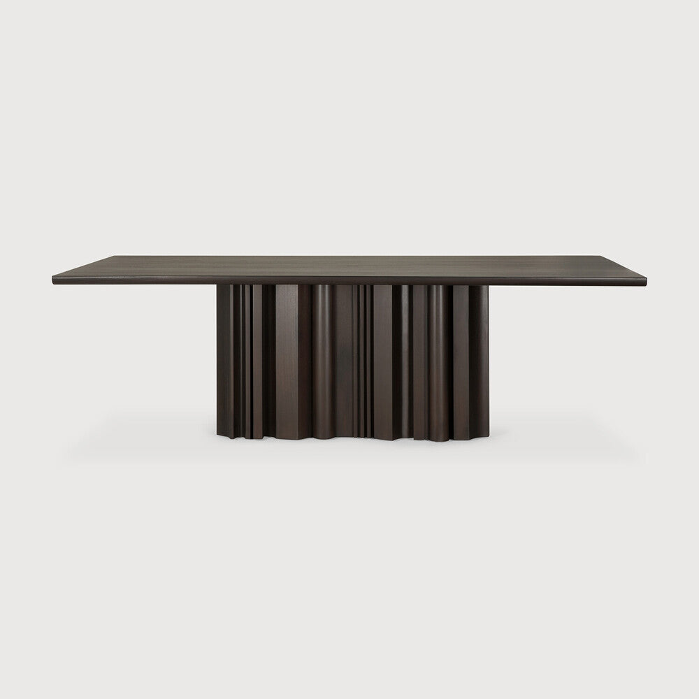 Ethnicraft Sequence Dining Table in mahogany styled in a dining room