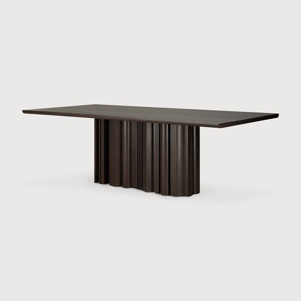 Ethnicraft Sequence Dining Table in mahogany styled in a dining room
