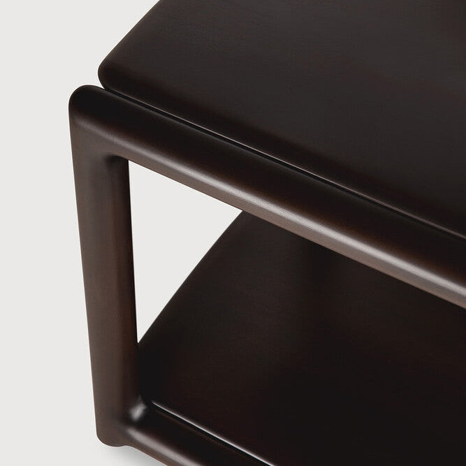 Detail of Ethnicraft Eda Side Table showing the rounded mahogany top edge
