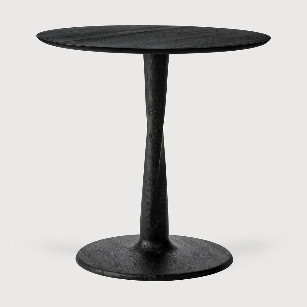 Ethnicraft Torsion Lounge Table in oak styled in a dining room