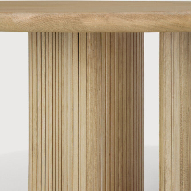 Ethnicraft Roller Max Dining Table in oak styled in a dining room