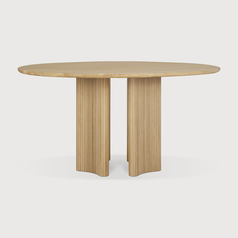 Ethnicraft Roller Max Dining Table in oak styled in a dining room