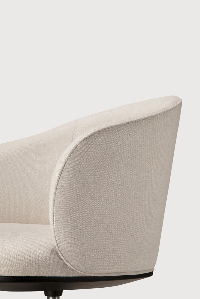 Detail of Ethnicraft Unda Office Chair showing the piped seam on the upholstered shell