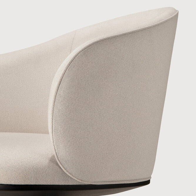 Detail of Ethnicraft Unda Office Chair showing the piped seam on the upholstered shell