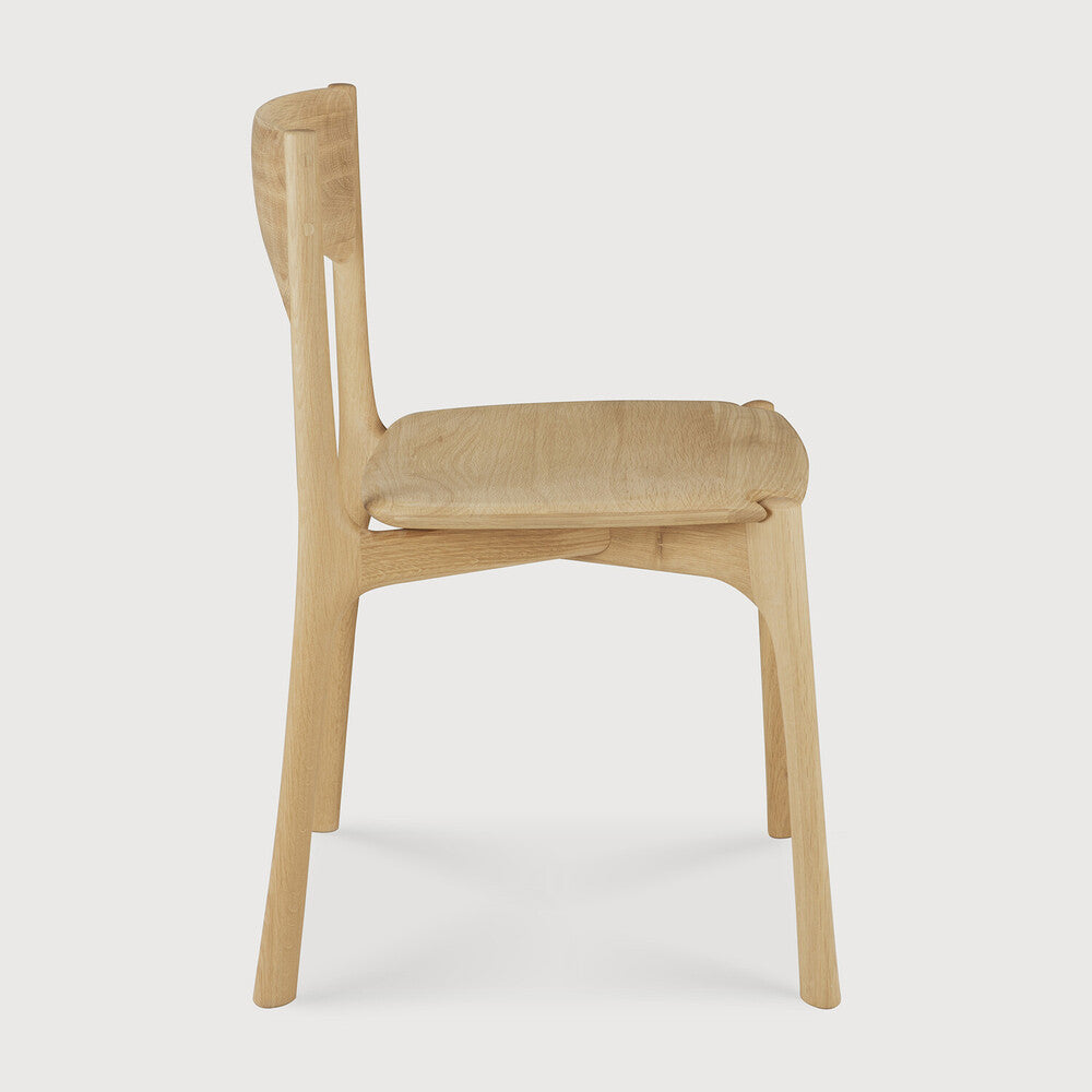 Ethnicraft Pi Dining Chair in oak styled in a dining room