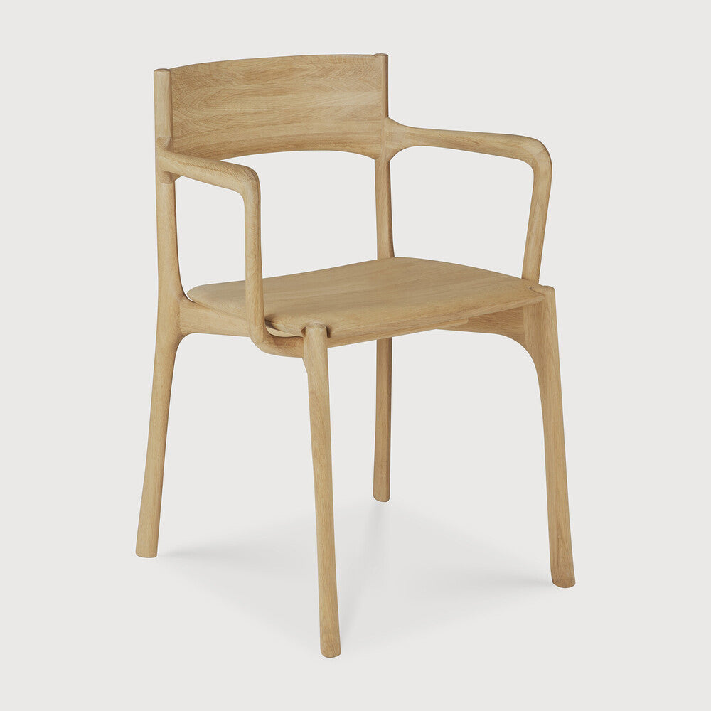 Ethnicraft Pi Dining Chair in oak styled in a dining room