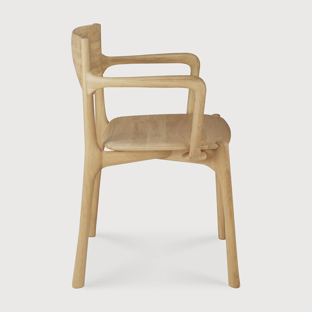 Ethnicraft Pi Dining Chair in oak styled in a dining room