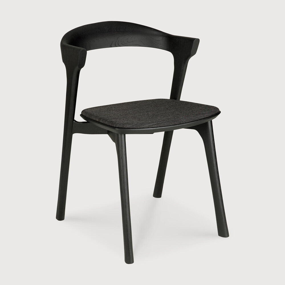 Ethnicraft Bok Dining Chair in oak styled in a dining room
