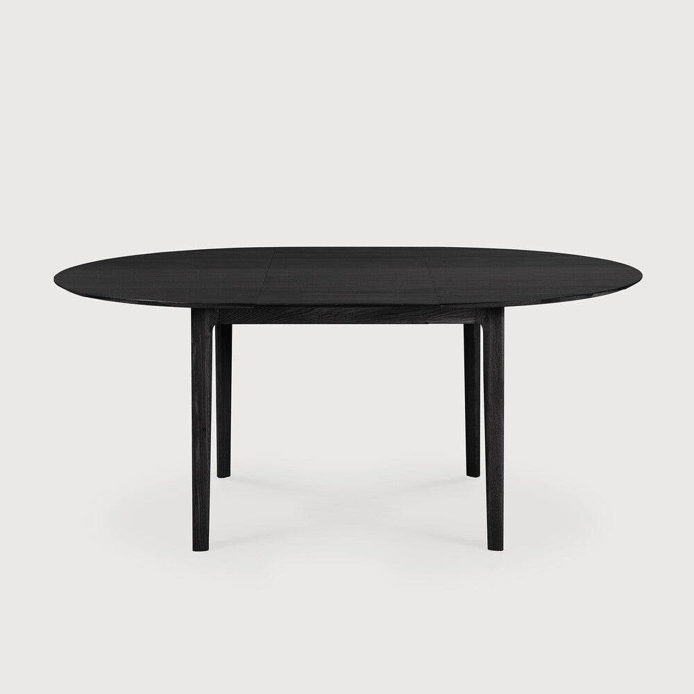 Ethnicraft Bok Extendable Dining Table in oak styled in a dining room