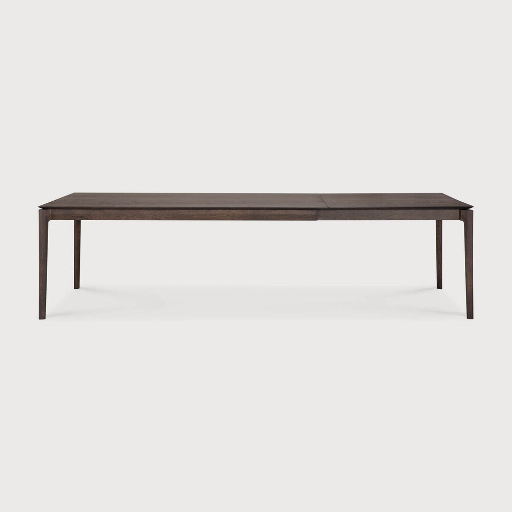 Ethnicraft Bok Extendable Dining Table in oak styled in a dining room