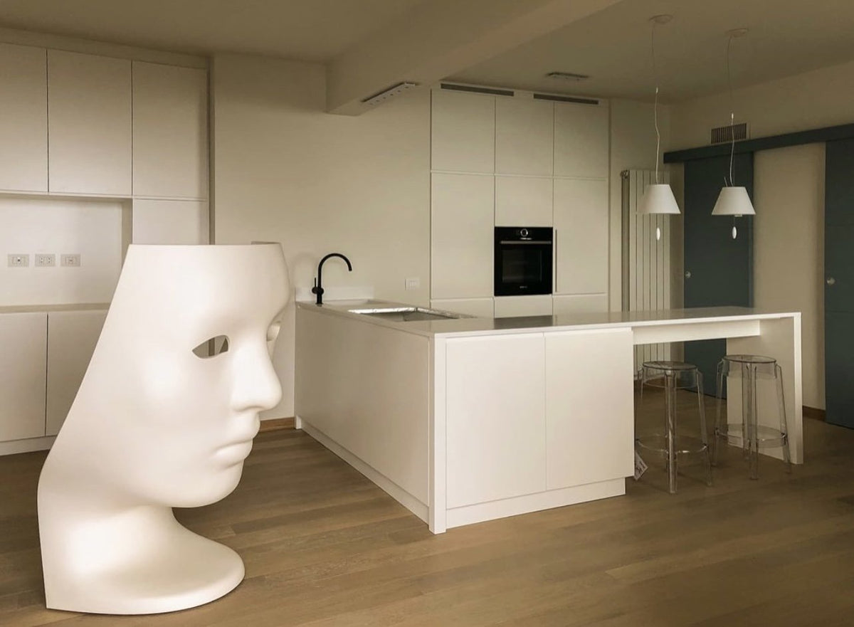 Luceplan Costanzina Pendants over a white kitchen island