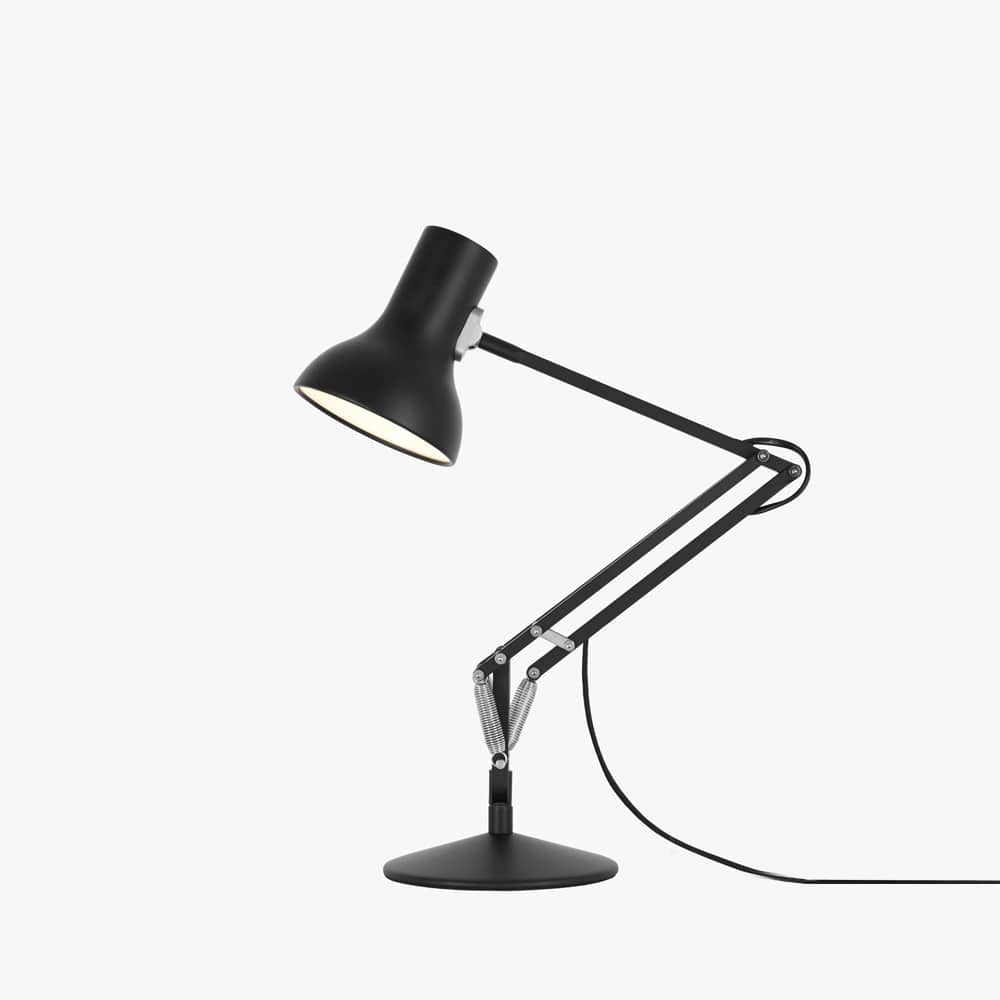 Anglepoise Type 75 Mini lamp in Jet Black on the table base included with the set, aluminum