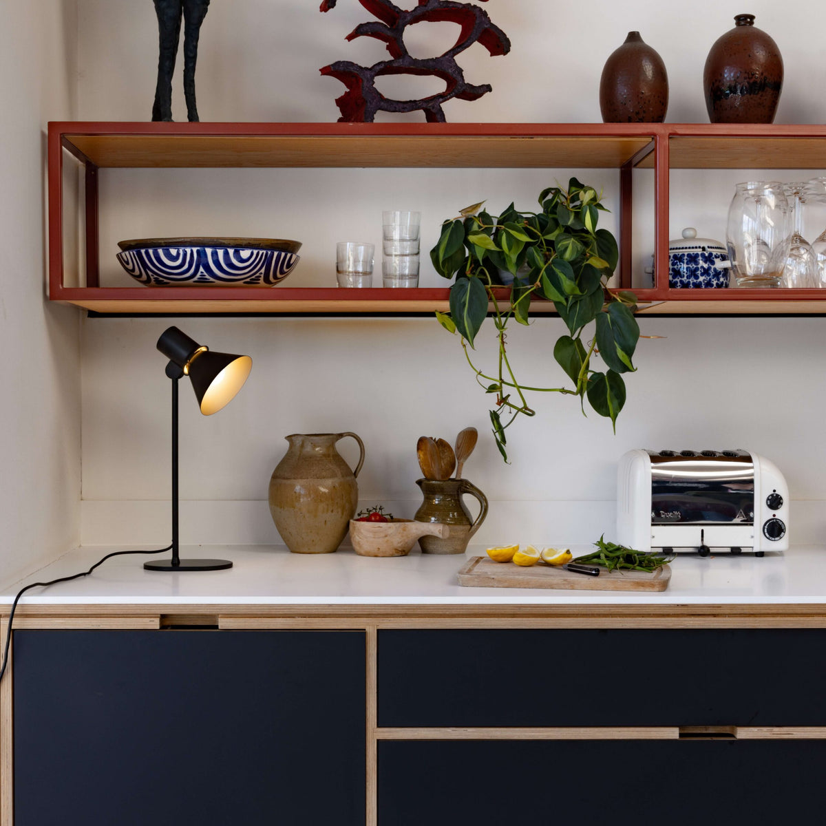 Anglepoise Type 80 T1 Table Lamp in Matte Black, styled in an interior setting, aluminum and steel
