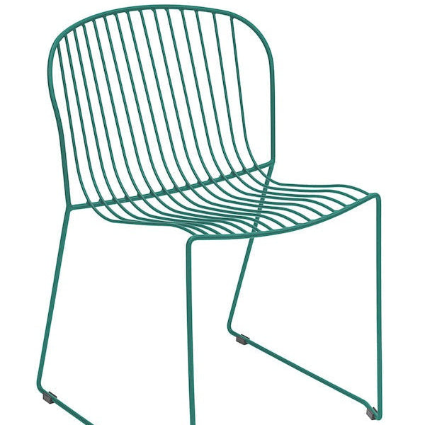 Isimar Bolonia Side Chair in Emerald Green styled on an outdoor terrace, Spanish design since 1925
