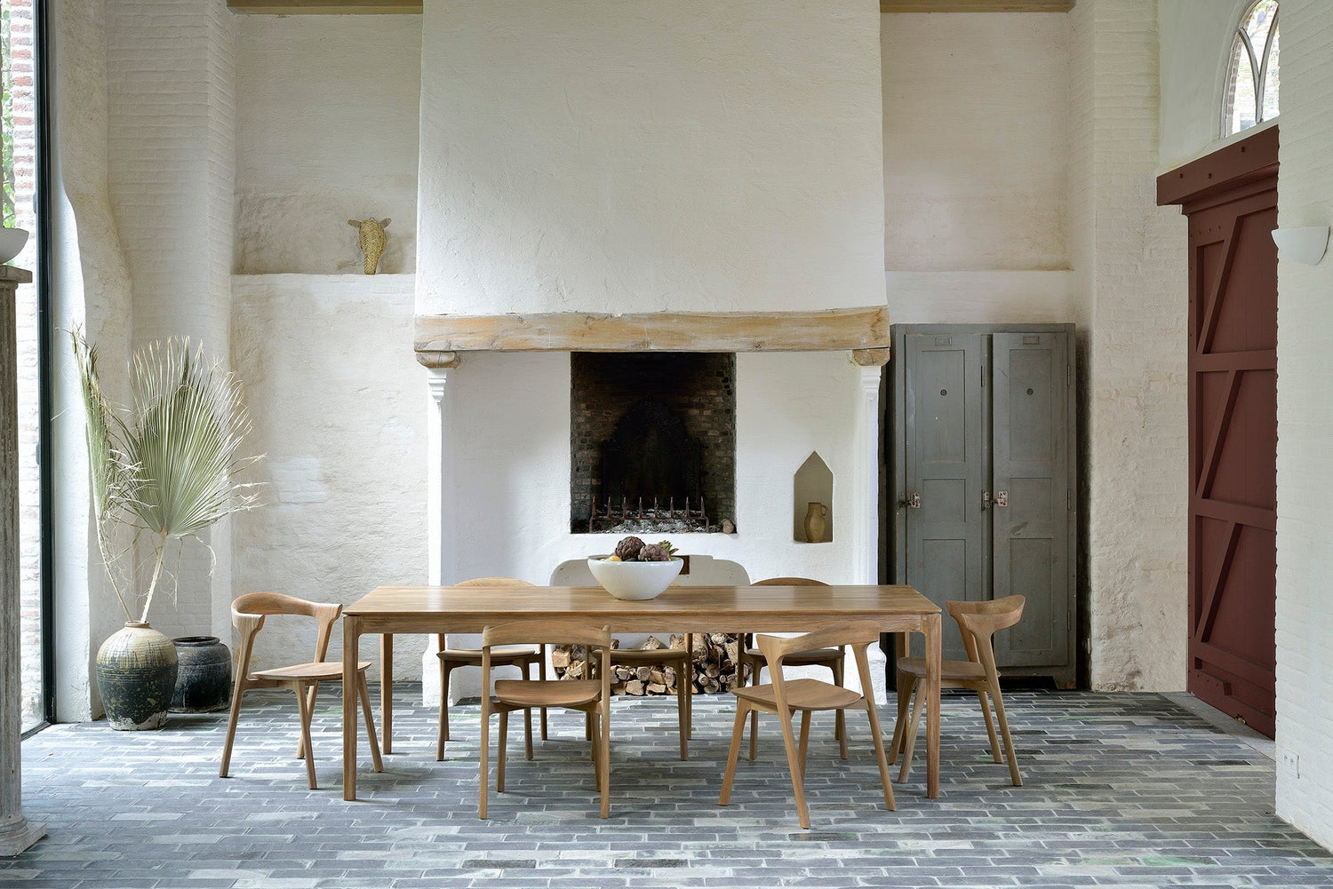 Bok dining chairs in solid oak around a dining table