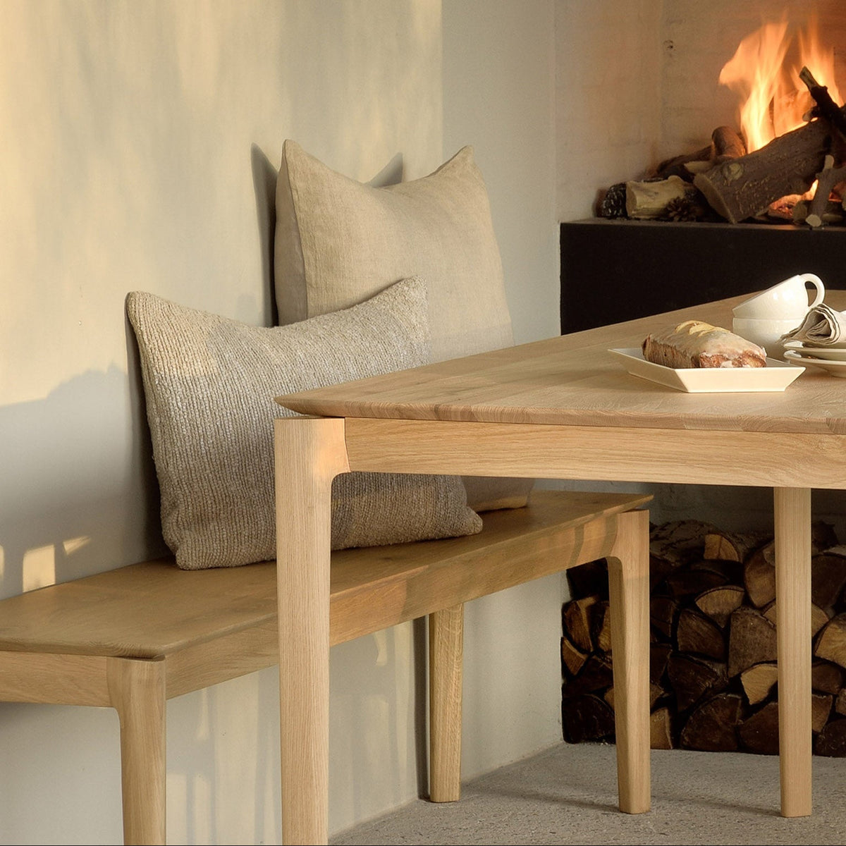 Ethnicraft Bok dining table and bench in solid oak with hardwax oil finish in a dining room