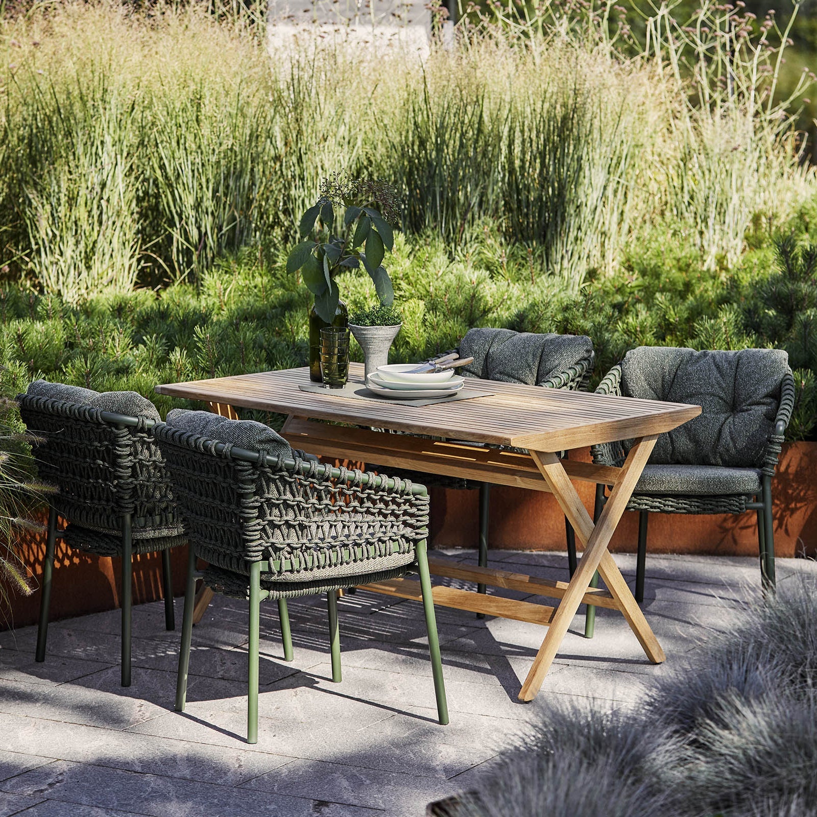 Cane-line Flip folding table in a Danish outdoor setting