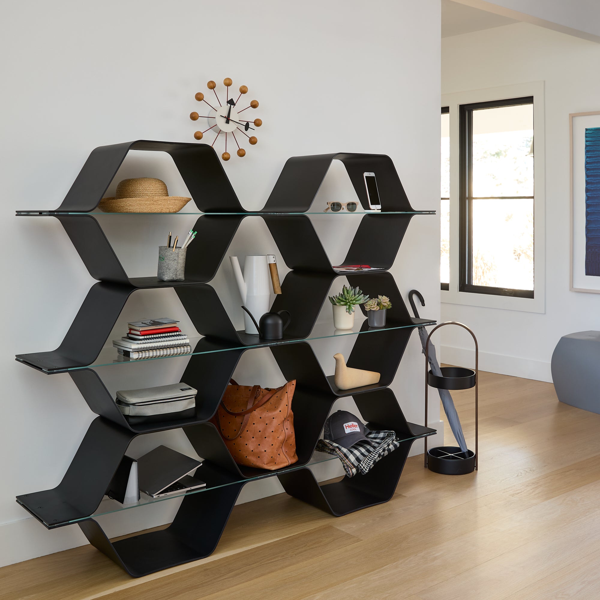 Honeycomb wall storage in a home office entryway