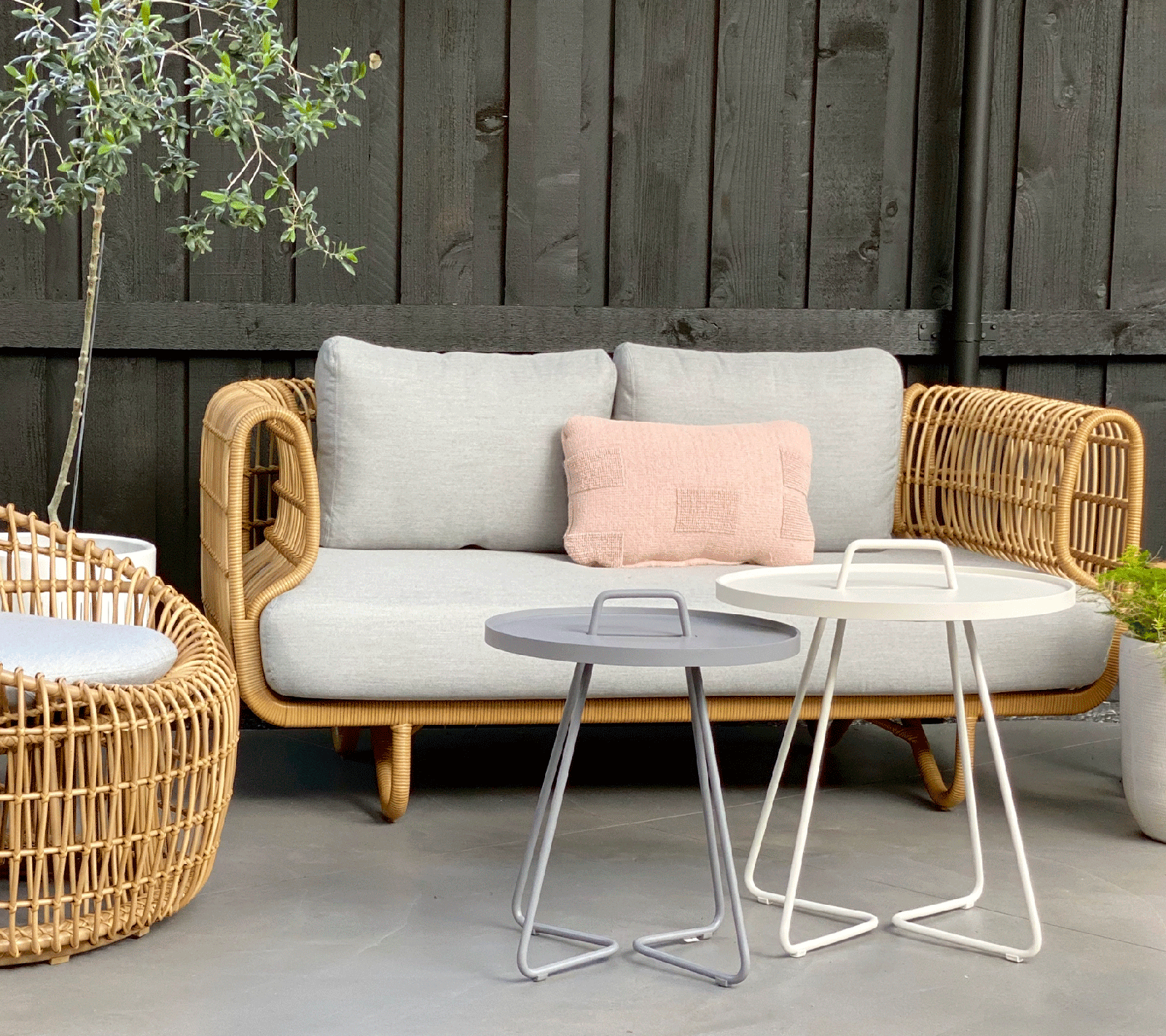 Compact side table styled for a small apartment living space