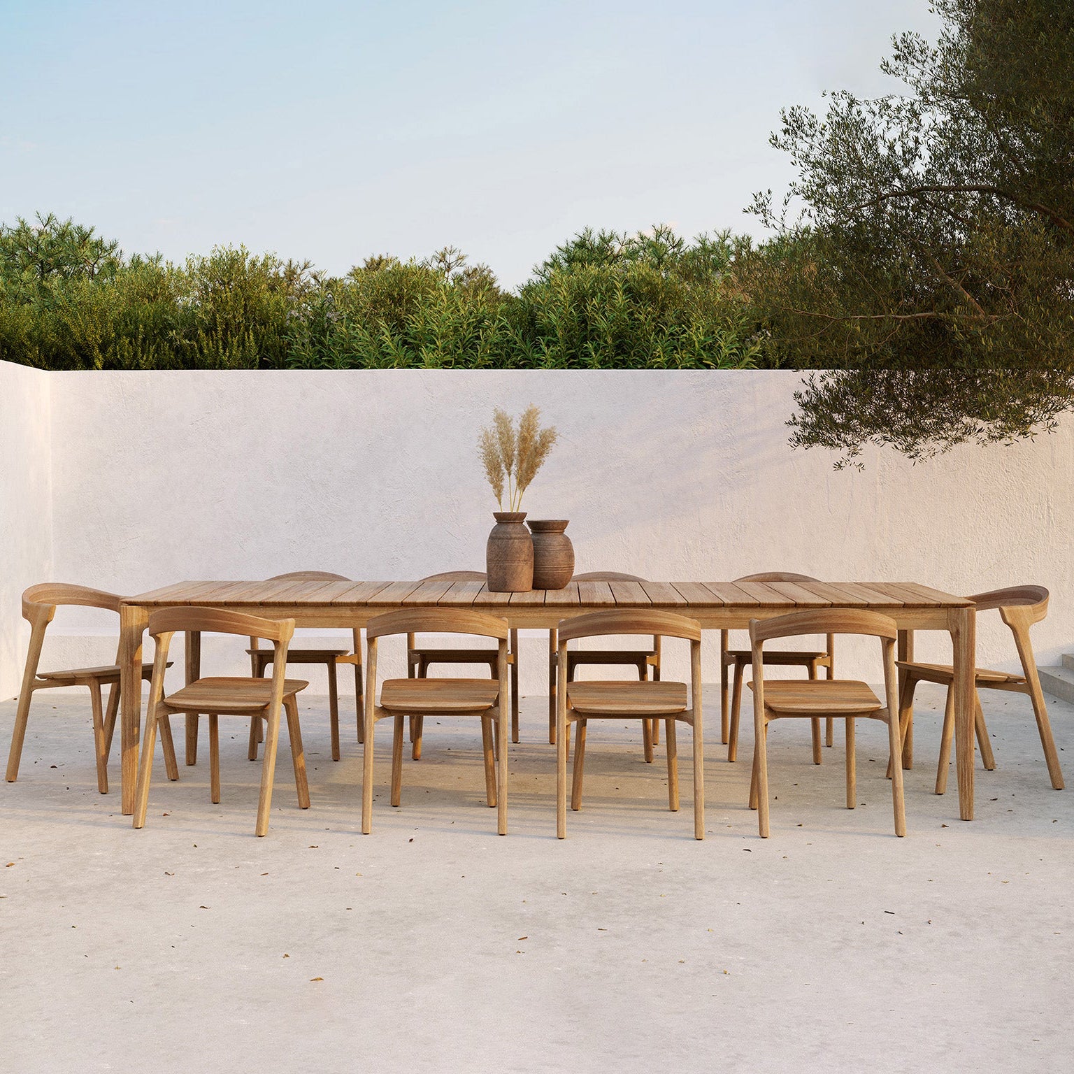 Ethnicraft Bok Outdoor Dining Chair in teak styled in a dining room