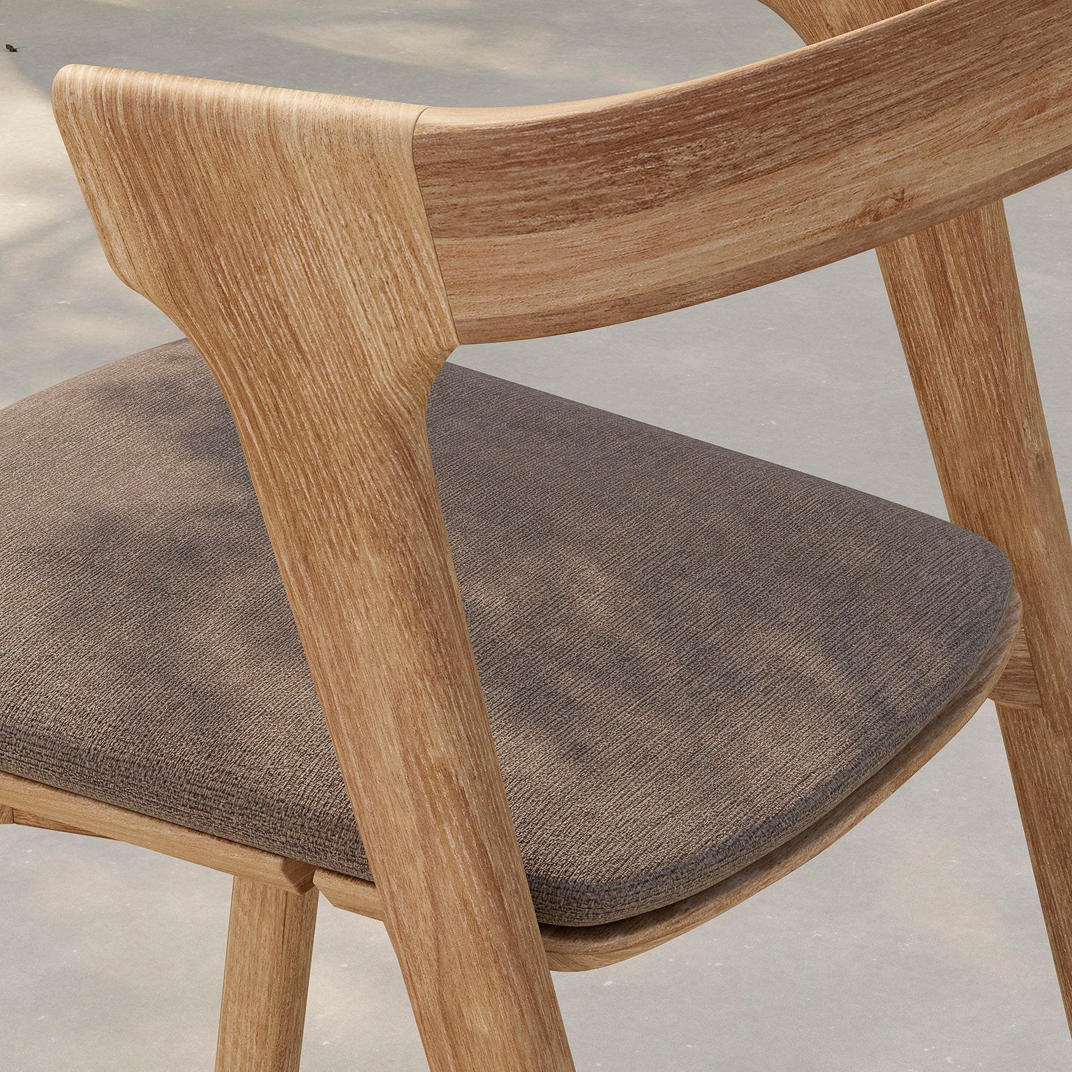Ethnicraft Bok Outdoor Dining Chair Cushion styled in a dining room