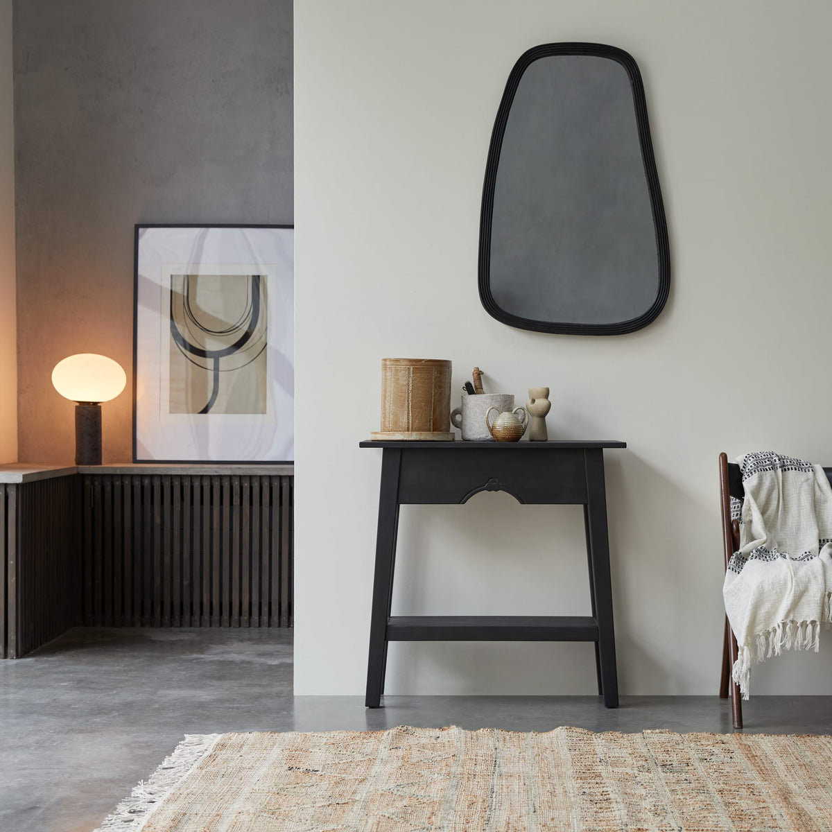 Tikamoon Thaki Black console table in solid pine, angled view