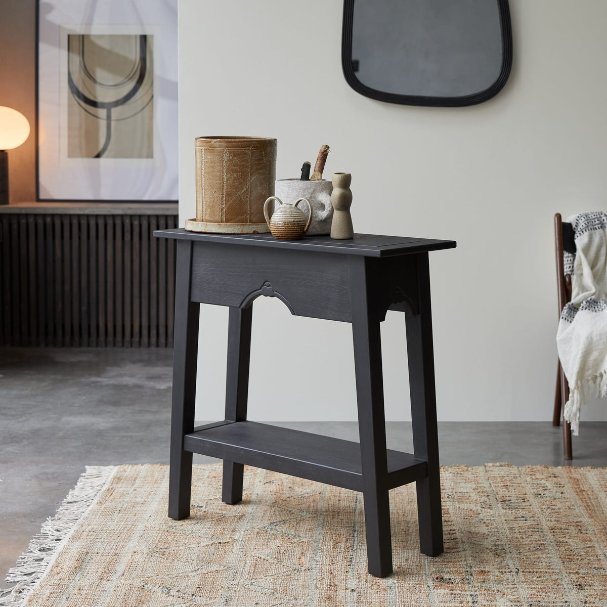 Tikamoon Thaki Black console table in solid pine, side view showing the 11.8-inch depth