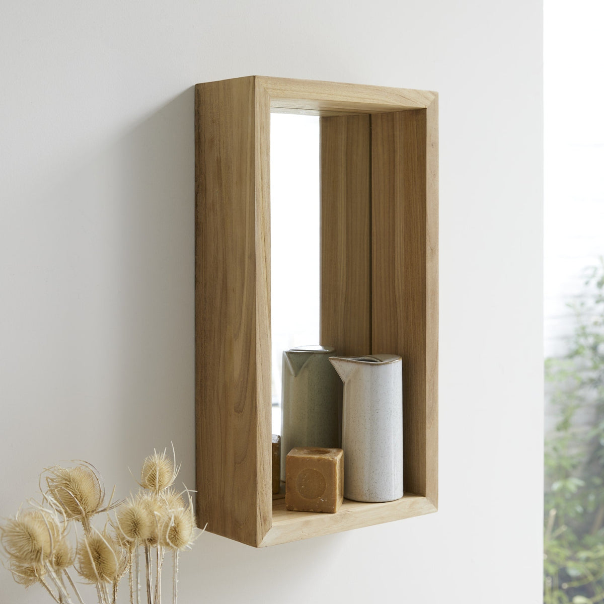 Tikamoon Stelle bathroom mirror in solid teak, angled view