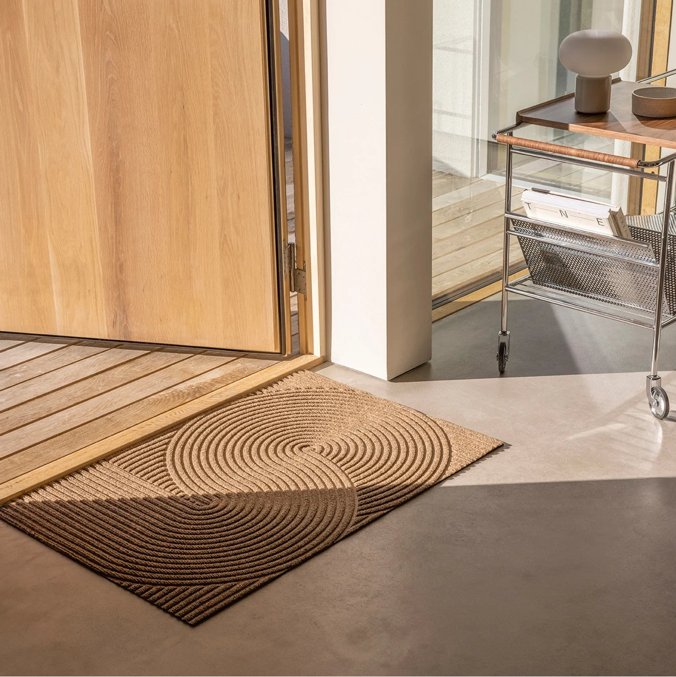 Heymat Sand All Weather Doormat doormat in Sand Beige styled in an entryway, recycled PET yarn Norwegian design
