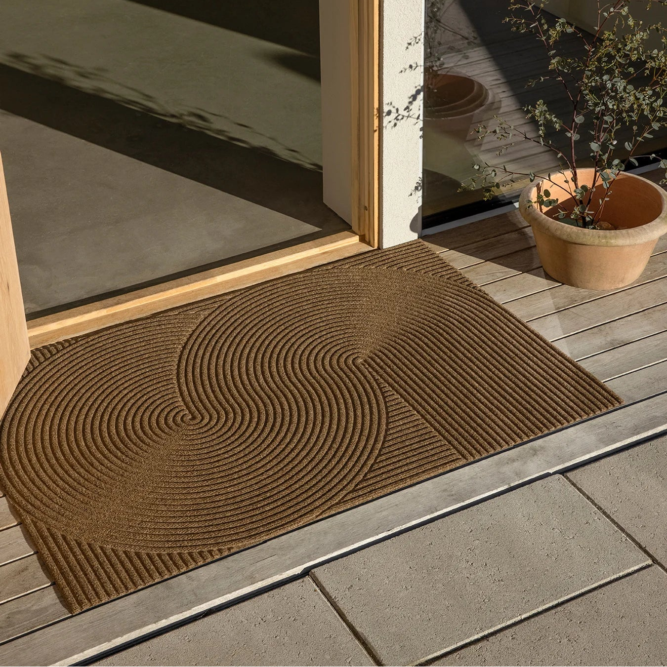 Heymat Sand All Weather Doormat doormat in Sand Beige styled in an entryway, recycled PET yarn Norwegian design