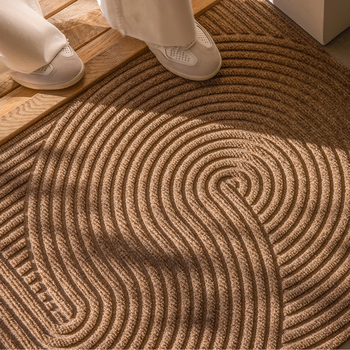Heymat Sand All Weather Doormat doormat in Sand Beige styled in an entryway, recycled PET yarn Norwegian design