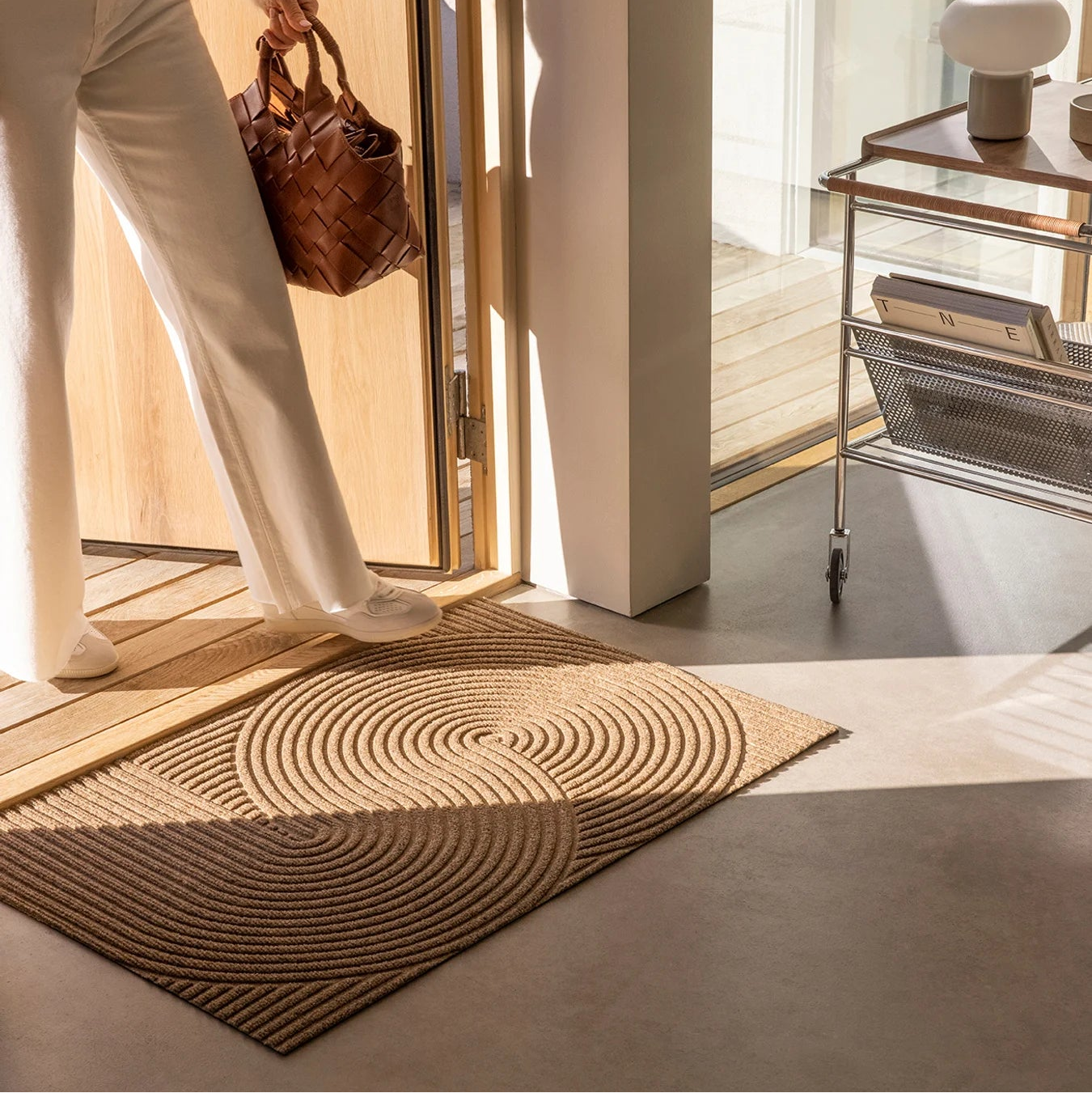 Heymat Sand All Weather Doormat doormat in Sand Beige styled in an entryway, recycled PET yarn Norwegian design