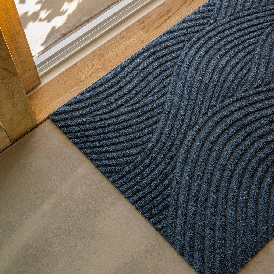 Heymat Sjø All Weather Doormat doormat in Blue styled in an entryway, recycled PET yarn Norwegian design