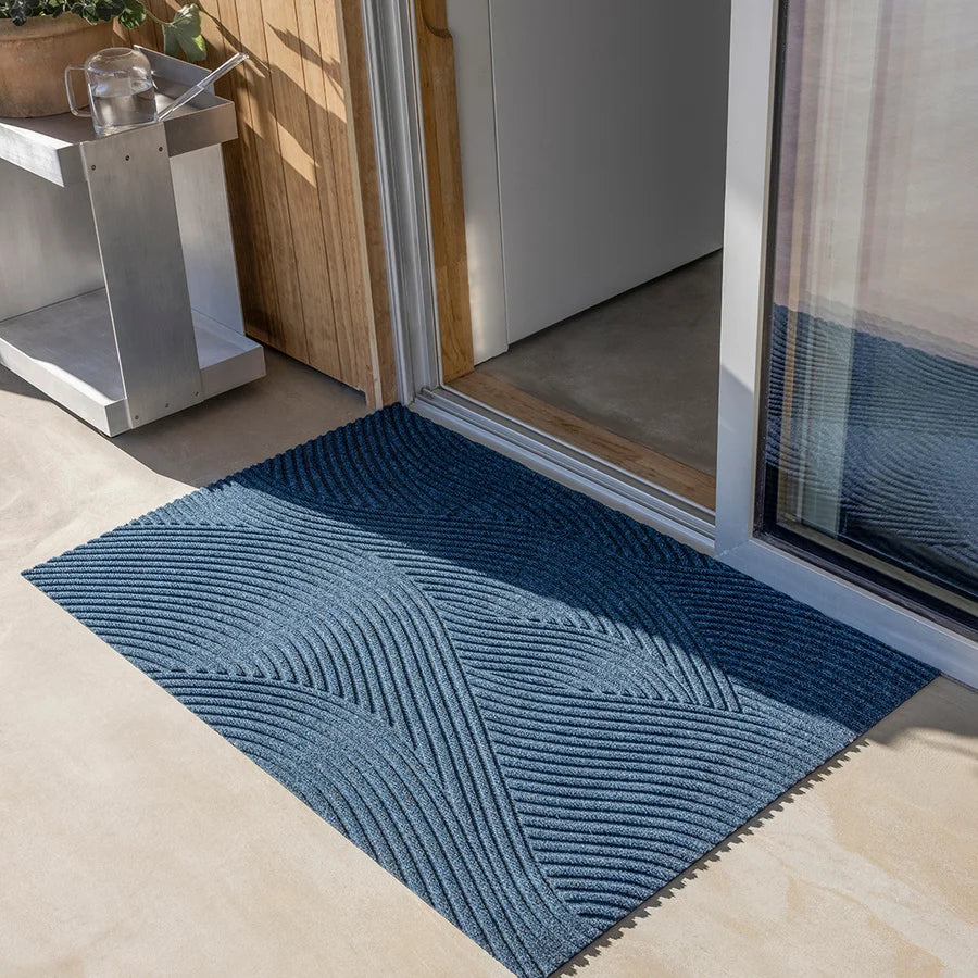 Heymat Sjø All Weather Doormat doormat in Blue styled in an entryway, recycled PET yarn Norwegian design