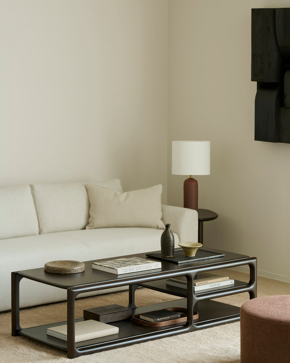 Ethnicraft Eda Coffee Table rectangular in Rose Brown, styled in an interior setting, solid mahogany