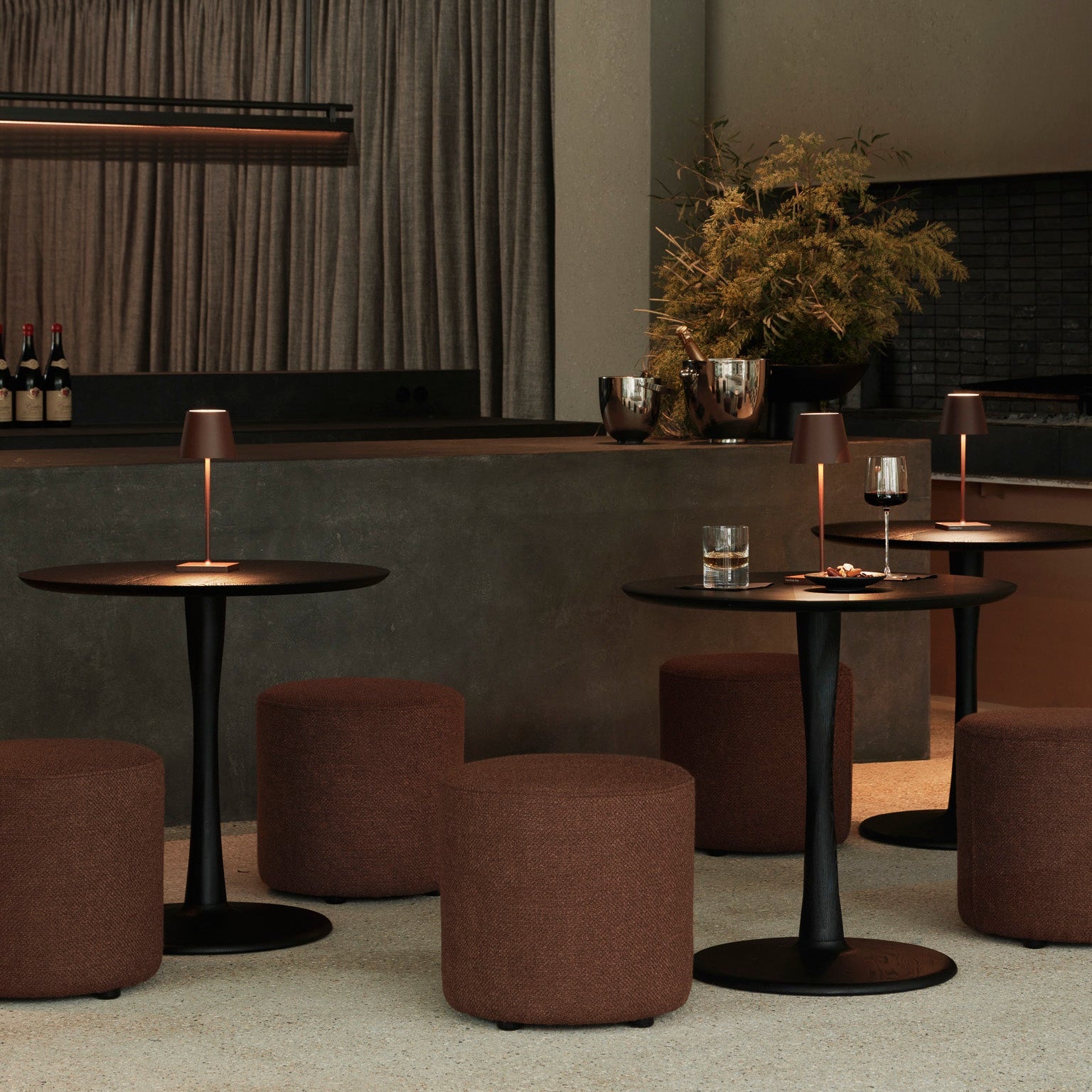 Ethnicraft Torsion Square Dining Table in oak styled in a dining room