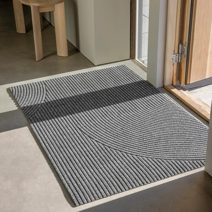 Heymat Stein All Weather Doormat doormat in Grey styled in an entryway, recycled PET yarn Norwegian design