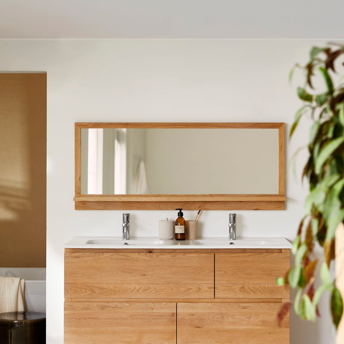 Tikamoon Easy wall mirror in solid oak, angled view