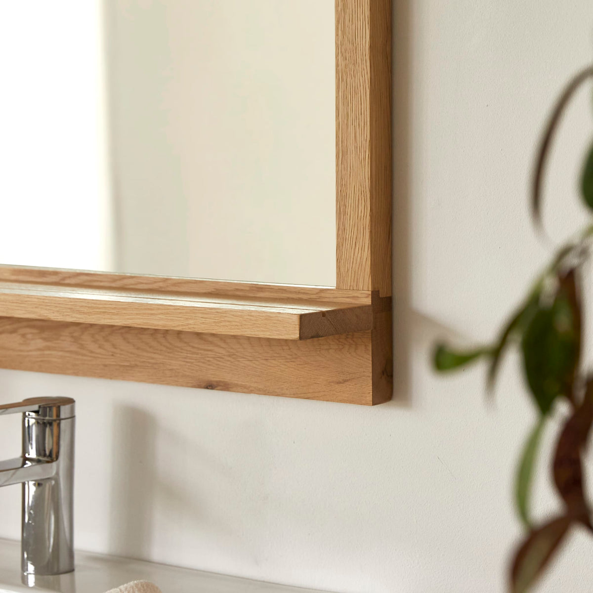 Tikamoon Easy wall mirror in solid oak, side view showing the 4.7-inch frame depth