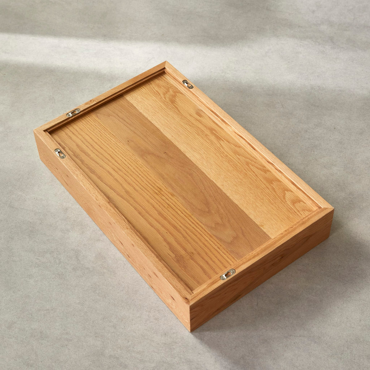 Tikamoon Easy oak wall mirror, detail of the lower frame edge used as a ledge