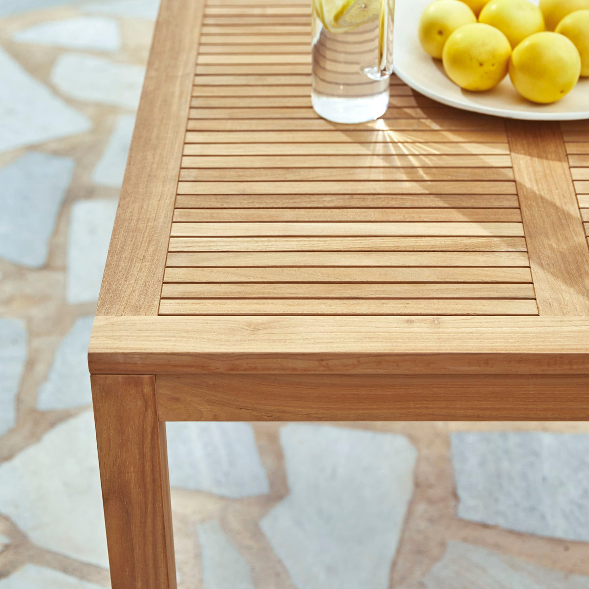 Tikamoon Téo teak bench, angled view of the slatted top