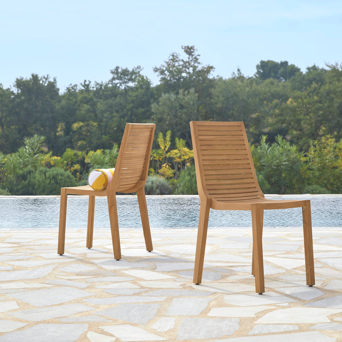Tikamoon Teo outdoor dining chair in solid teak, angled view