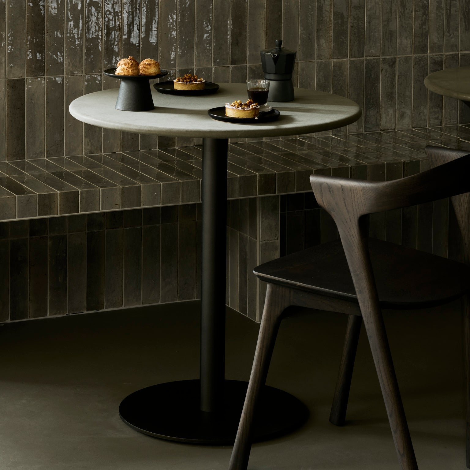 Ethnicraft Blend Dining Table in teak styled in a dining room