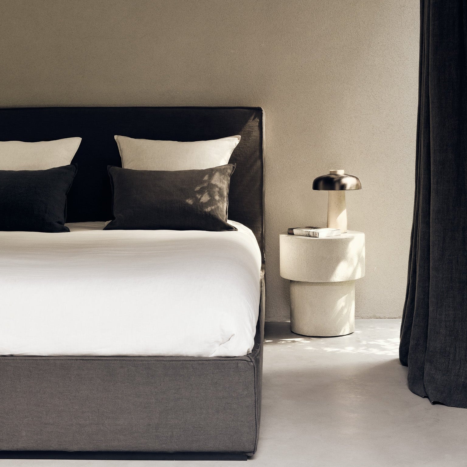 Ethnicraft Revive headboard and bed frame styled in an interior setting