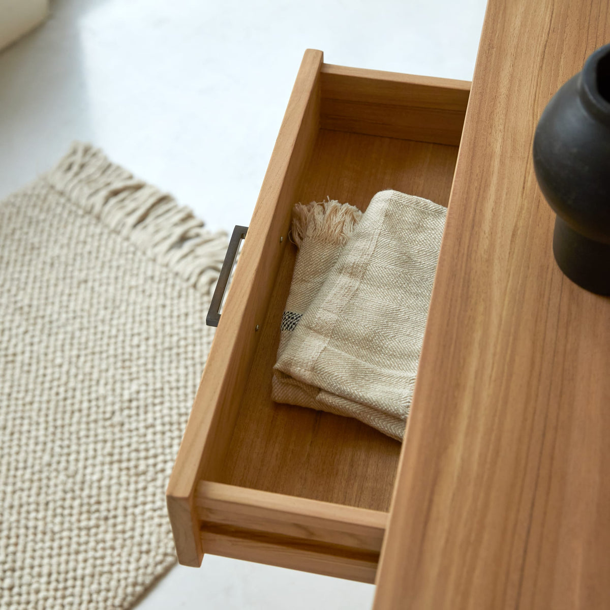 Tikamoon Maë sideboard in solid teak, straight-on studio shot