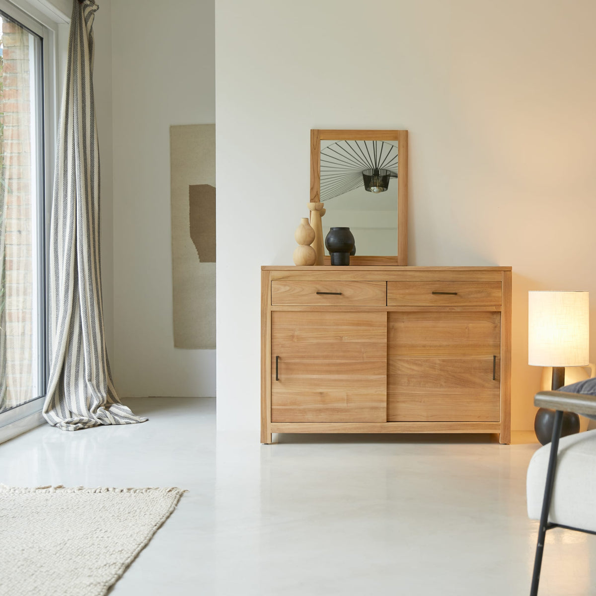 Tikamoon Maë sideboard in solid teak, angled view