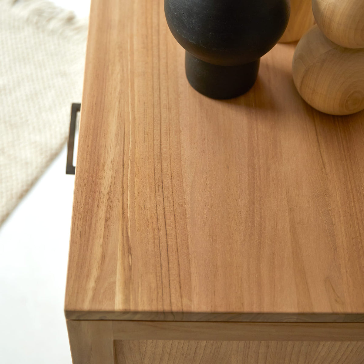 Tikamoon Maë sideboard in solid teak, three-quarter view from the right